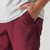 Burgundy Active Performance Short Outlet with pocketed design and comfort liner.