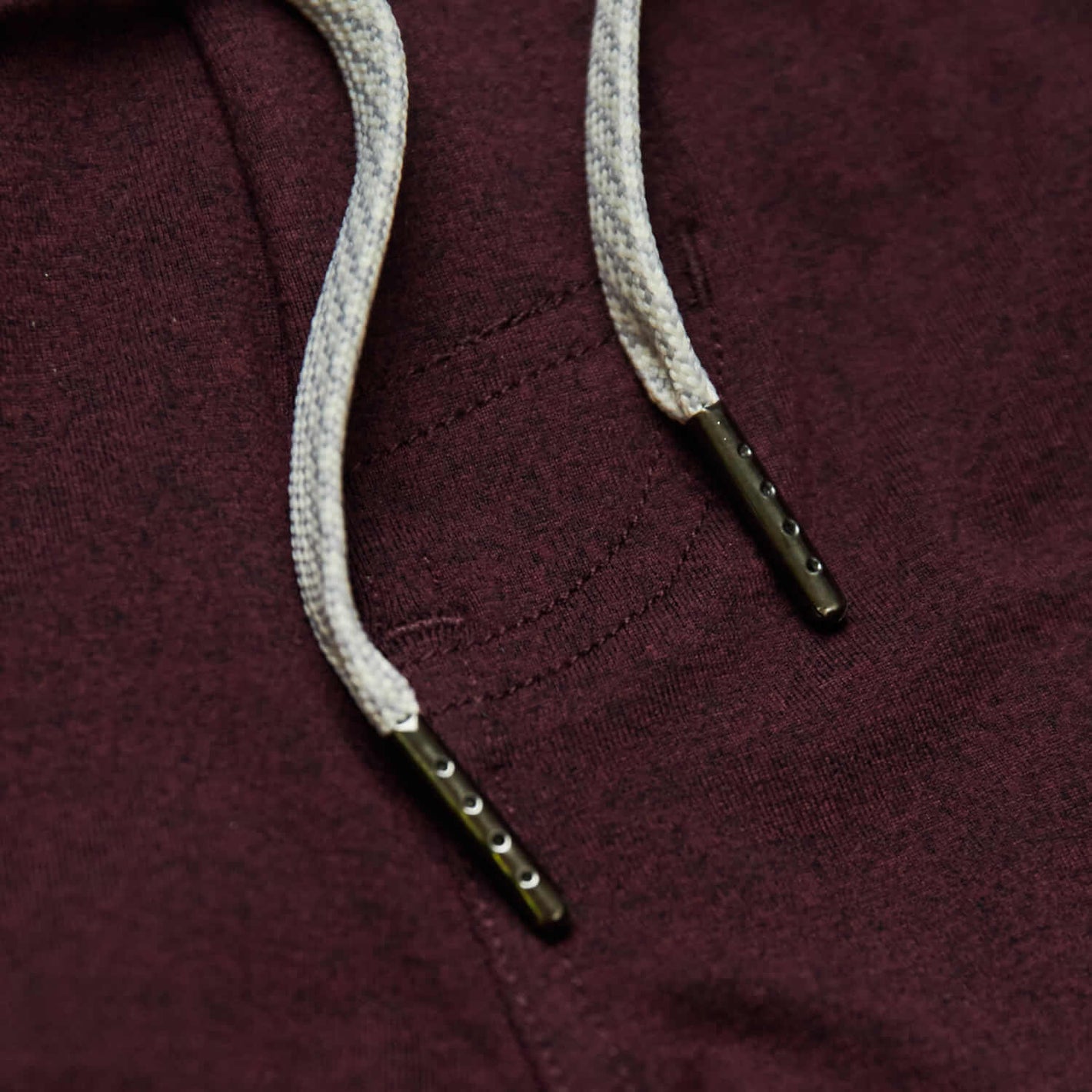 Dark Heather Burgundy Active Comfort Shorts close-up showing pocket stitching and drawcords.