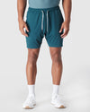 Dark Heather Centurion Active Comfort Shorts showcased with white socks and sneakers.