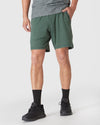 Heather Forest Active Comfort Shorts with side pockets and black Adidas trainers.
