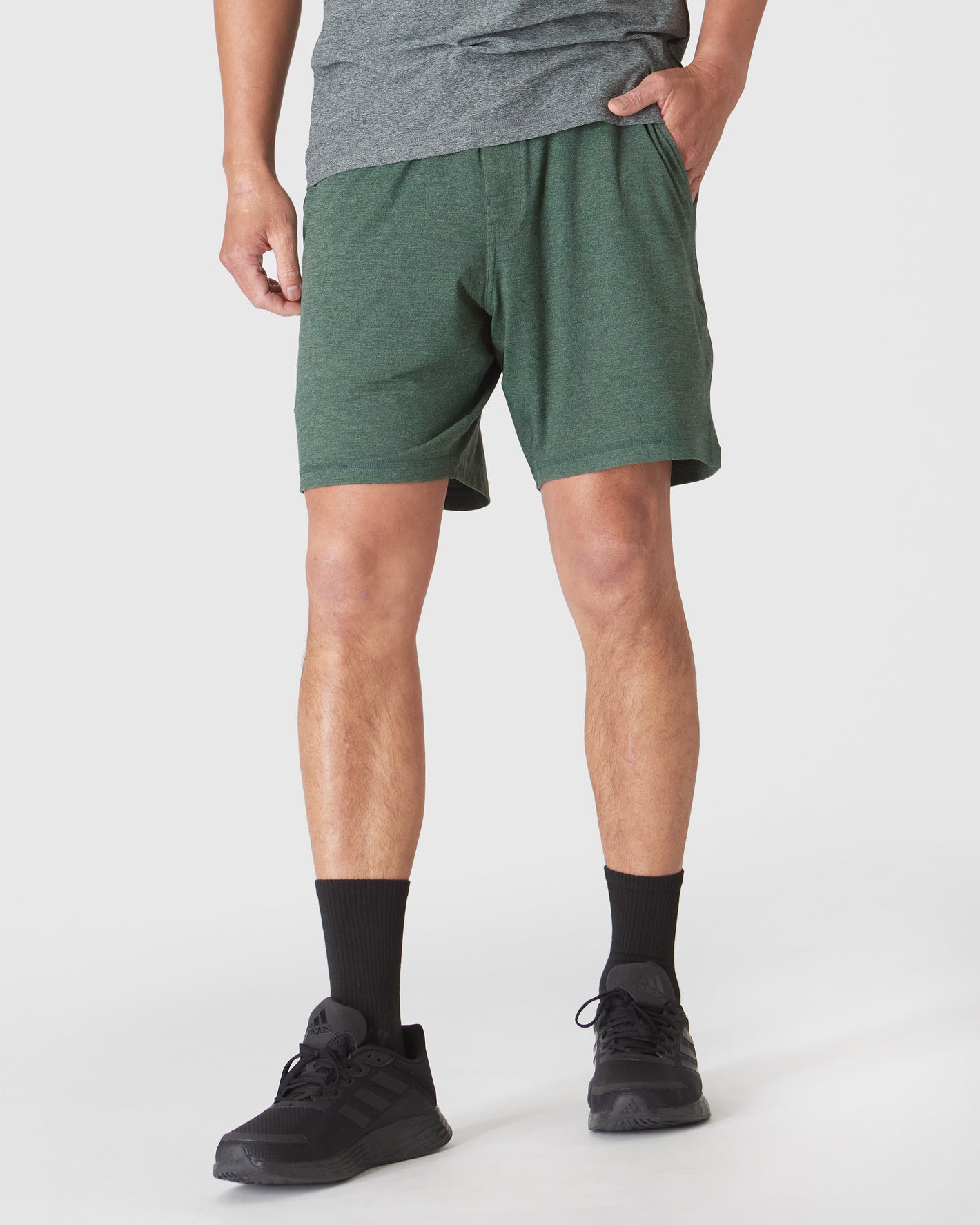 Heather Forest Active Comfort Shorts with side pockets and black Adidas trainers.