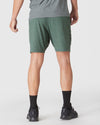 Heather Forest Active Comfort Shorts worn with gray T-shirt and black Adidas shoes.