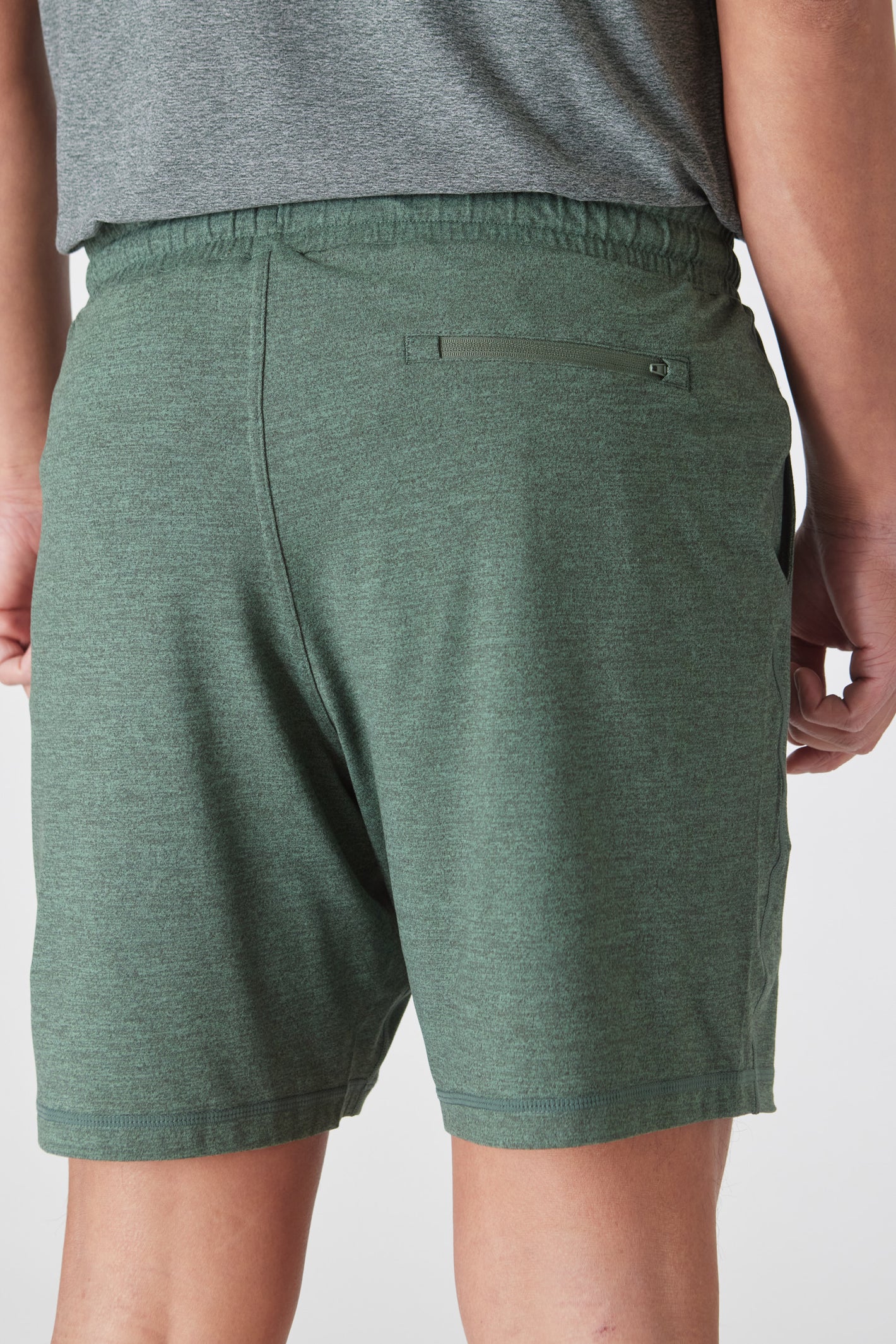 Heather Forest Active Comfort Shorts with elastic waistband and zippered pocket.
