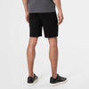 Man modeling 9 Black Comfort Knit Chino Shorts, back view.