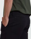 Black Commuter Short with back patch pocket and subtle zippered detail.