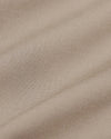 Macro shot of Khaki Commuter Short's woven fabric with visible threads.
