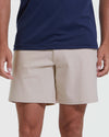 Sandstone Commuter Short worn with navy T-shirt, hands at sides.