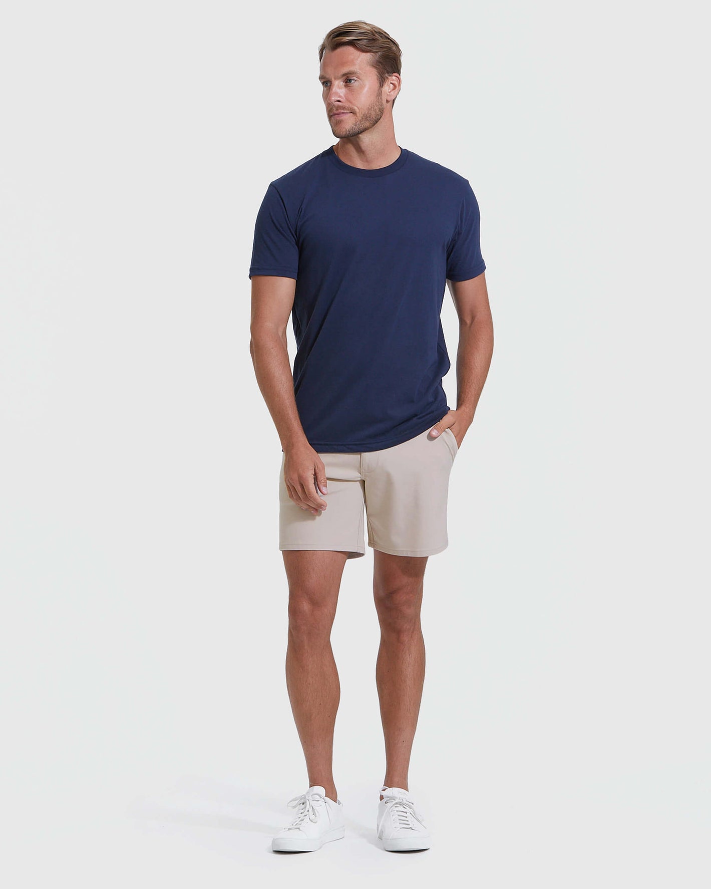 Man in Sandstone Commuter Short with hand in pocket.