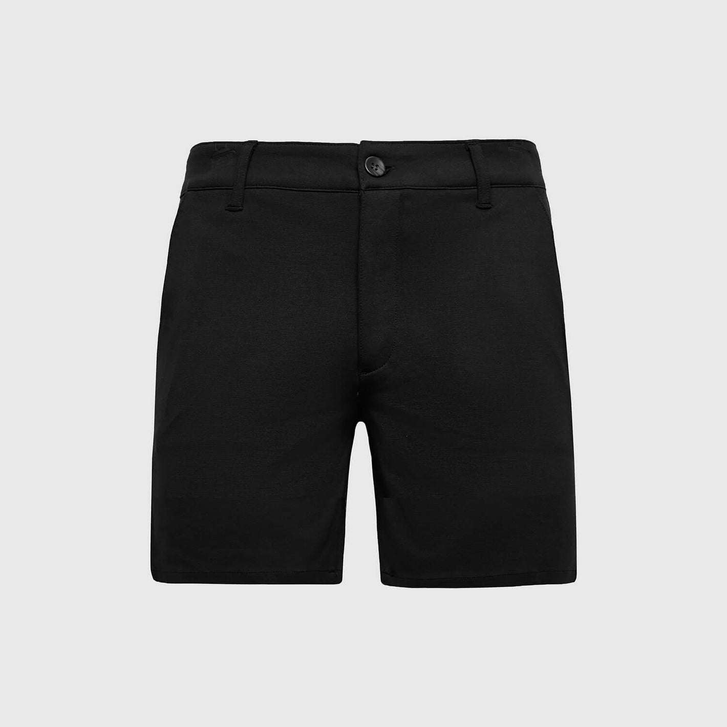 7 Black Comfort Knit Chino Shorts on light gray background.