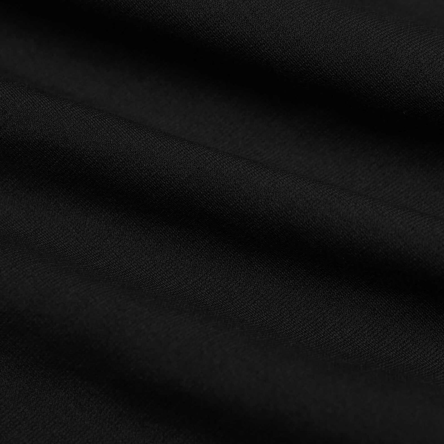 7 Black Comfort Knit Chino Shorts fabric close-up, showing fine weave.