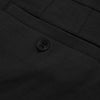 7 Black Comfort Knit Chino Shorts, close-up of welt pocket and button.