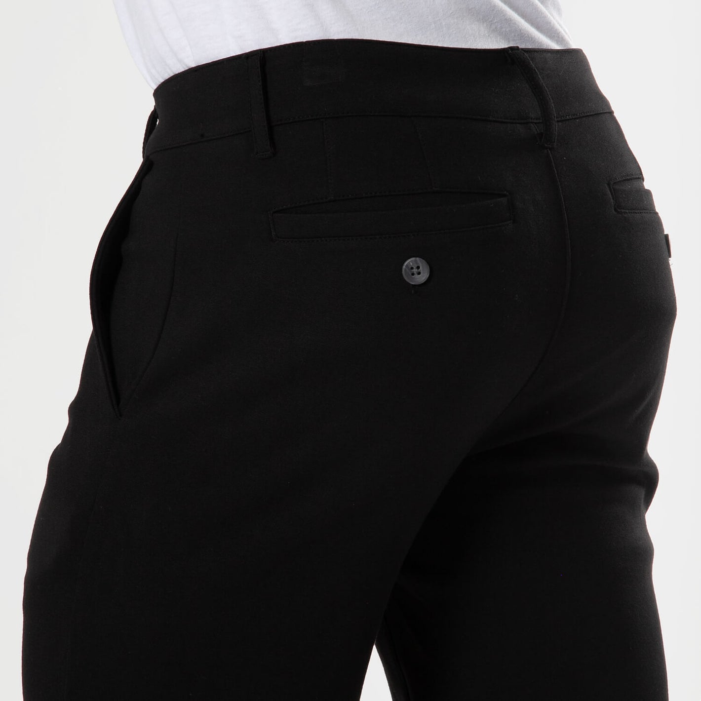 7 Black Comfort Knit Chino Shorts with slim-fit style and welted back pocket.