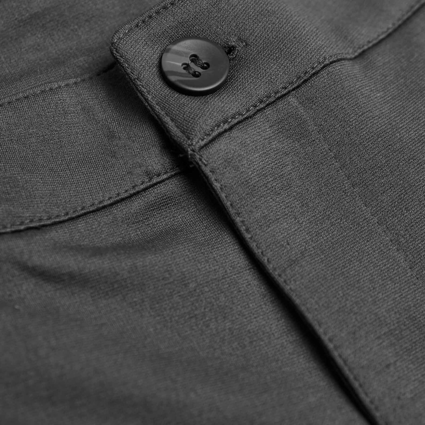 Carbon 7.5 Inseam Chino Shorts waistband detail with button and loop.