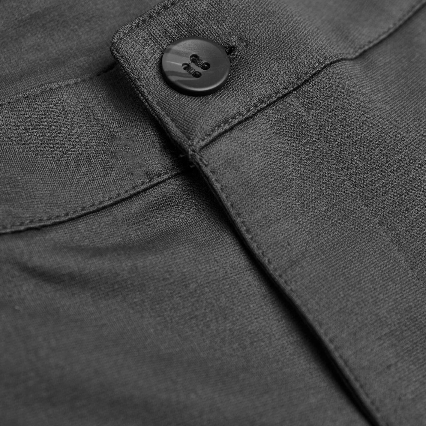 7 Carbon & Khaki Comfort Knit Chino Shorts close-up of waistband seam and button.