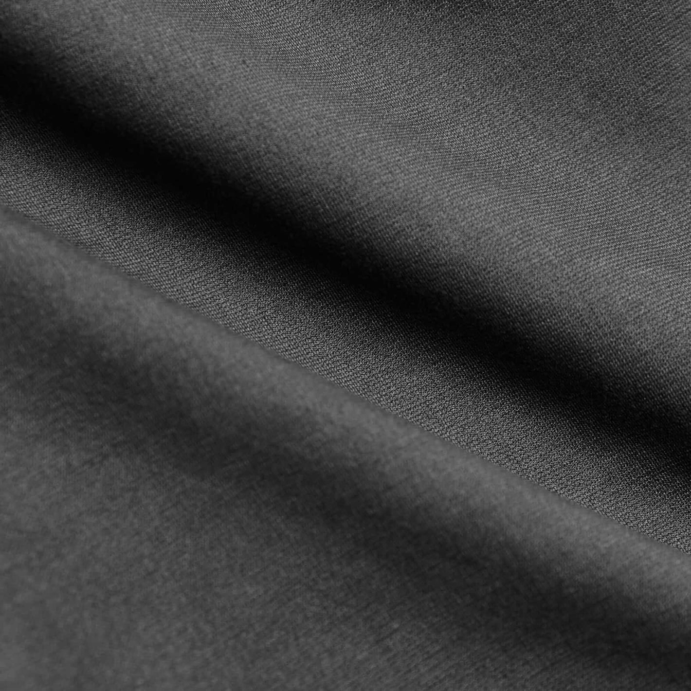 Carbon 7.5 Inseam Chino Shorts' dark-charcoal weave, softly draped.