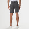 Back view of Carbon 7.5 Inseam Chino Shorts with sneakers.