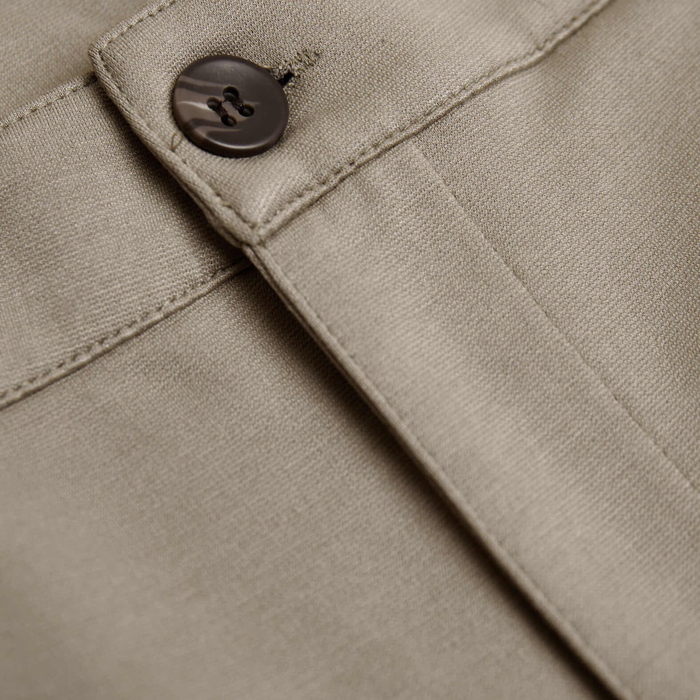 7 Khaki Comfort Knit Chino Shorts, close-up of waistband and button.