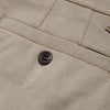 7 Khaki Comfort Knit Chino Shorts with welt pocket and brown button.