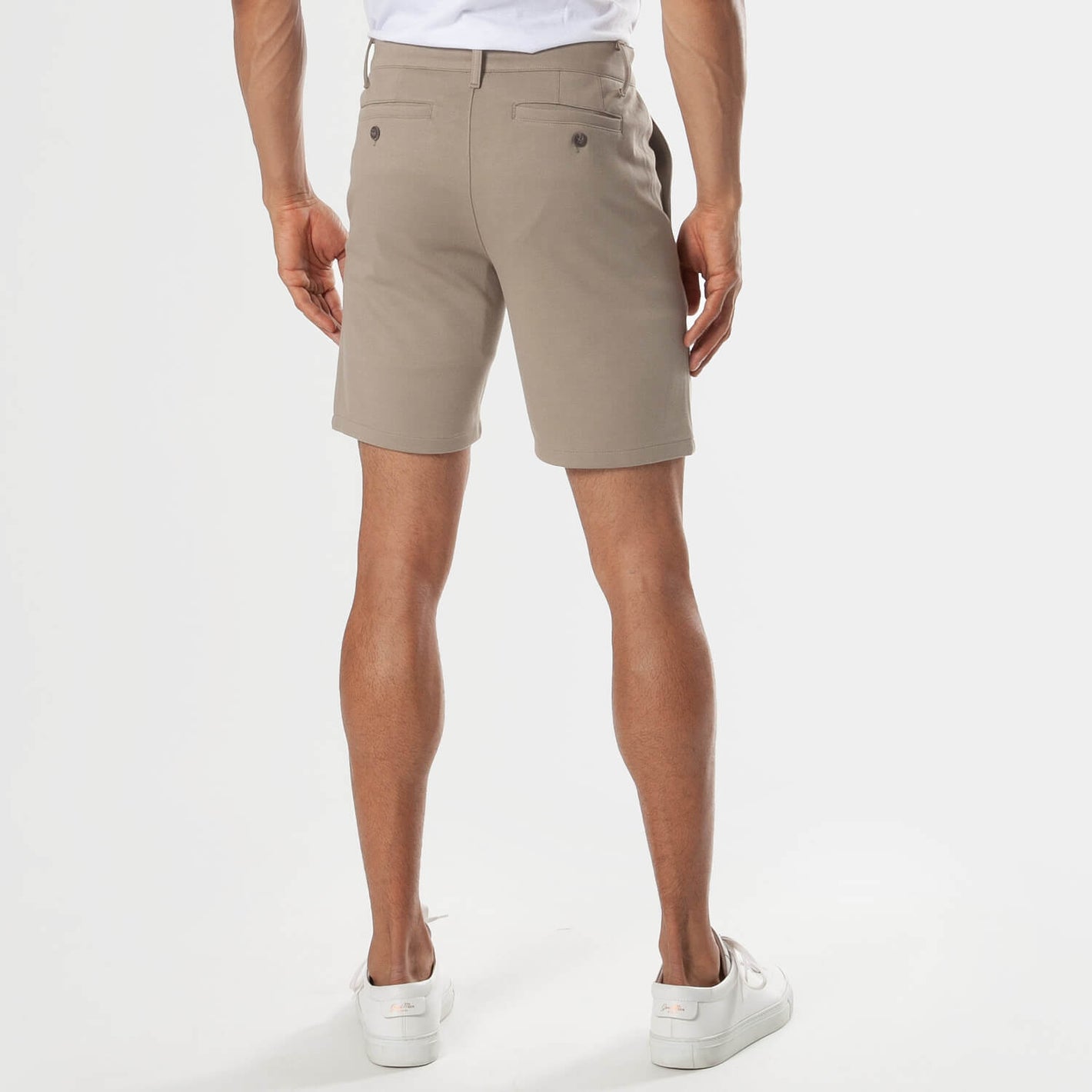 7 Khaki Comfort Knit Chino Shorts back view, paired with white tee.
