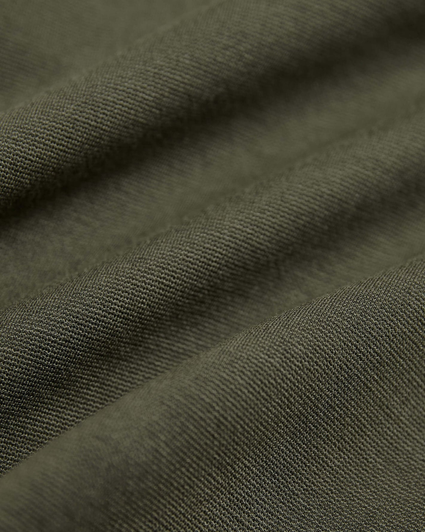7 Military Green Comfort Knit Chino Short fabric detail showing twill weave.