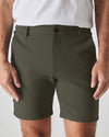 Man wearing 7 Military Green Comfort Knit Chino Short.