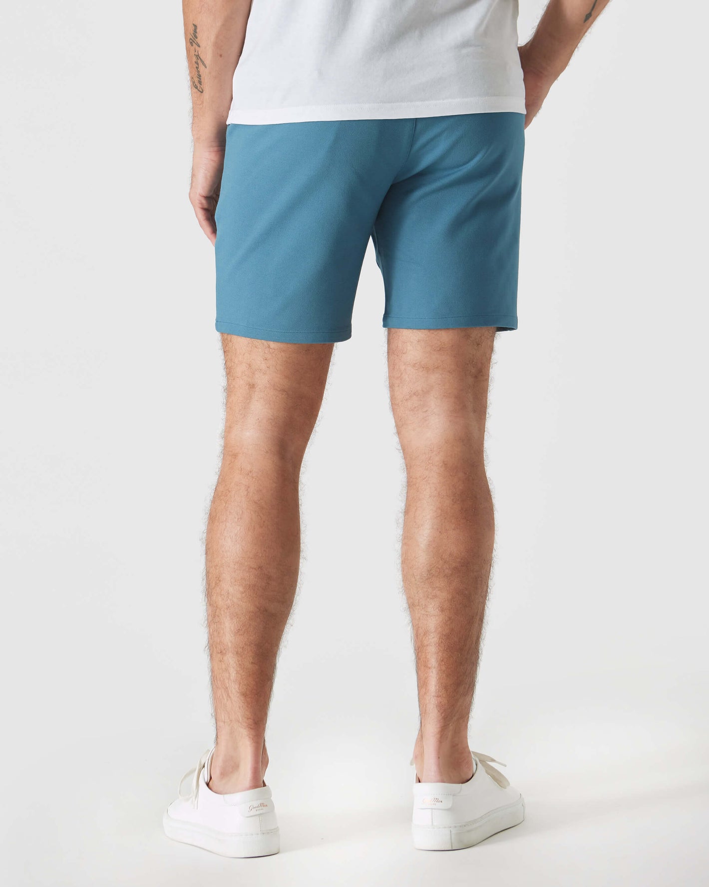 7 Sapphire Comfort Knit Chino Short in athletic slim fit, seen from behind.