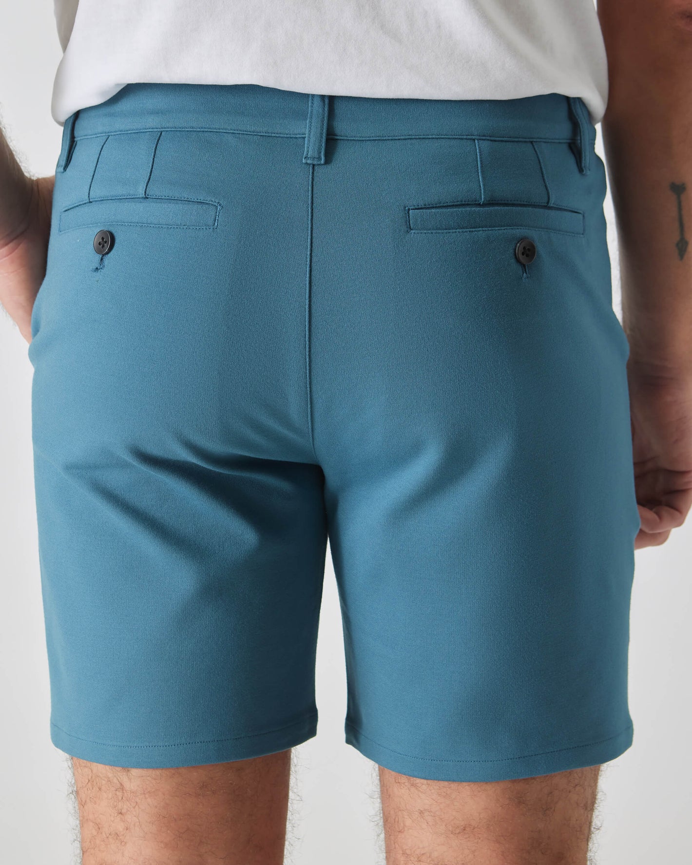 7 Sapphire Comfort Knit Chino Short, teal-blue, mid-thigh length, tailored fit.
