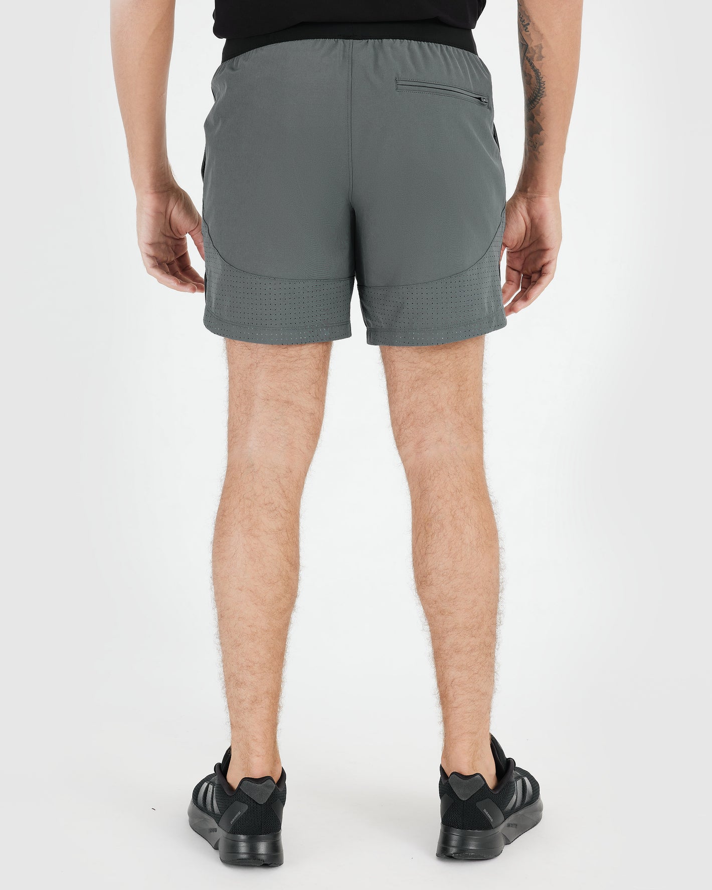 7 Carbon Active Training Shorts 2.0, rear view, zip pocket visible.