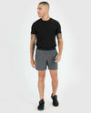 Man wearing 7” Carbon Active Training Short in a fitness pose.