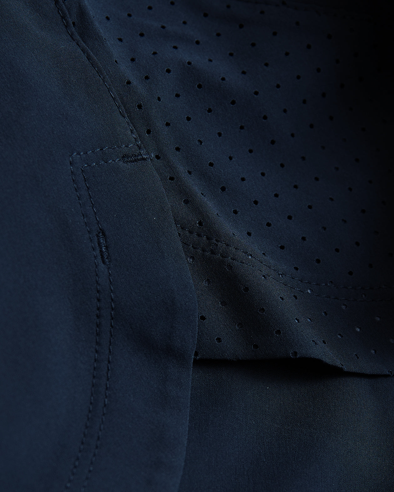 7 Navy Active Training Shorts 2.0 close-up showing perforated vent panel.