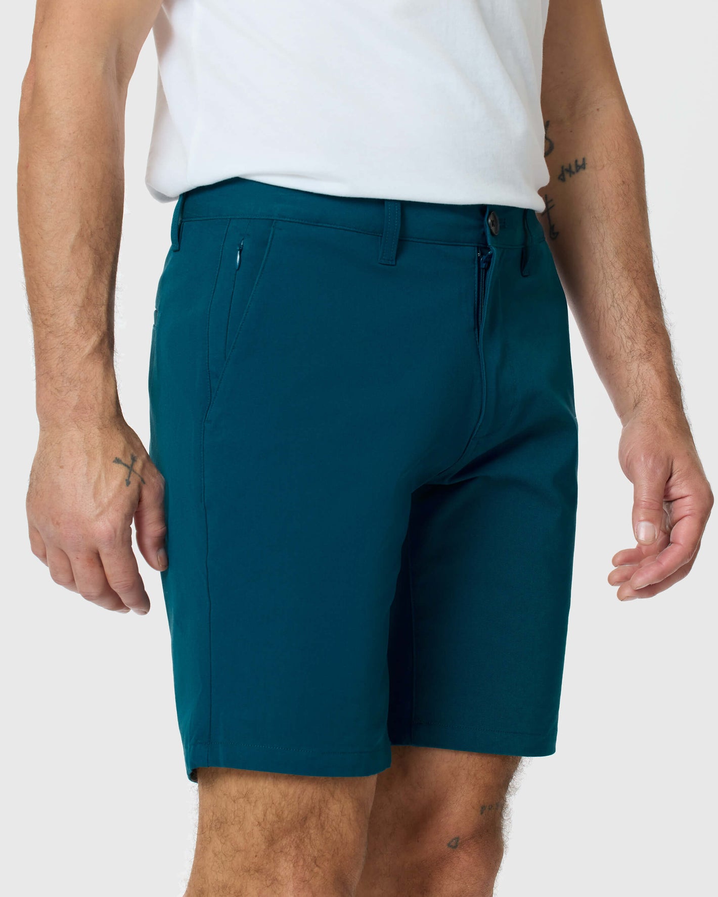 Centurion Twill Short with pockets and belt loops, worn mid-length.