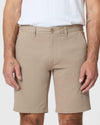 Khaki Twill Short with button closure and side pockets, tattooed legs visible.