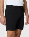 7 Black Classic Twill Shorts with zip-pocket, worn by male model.