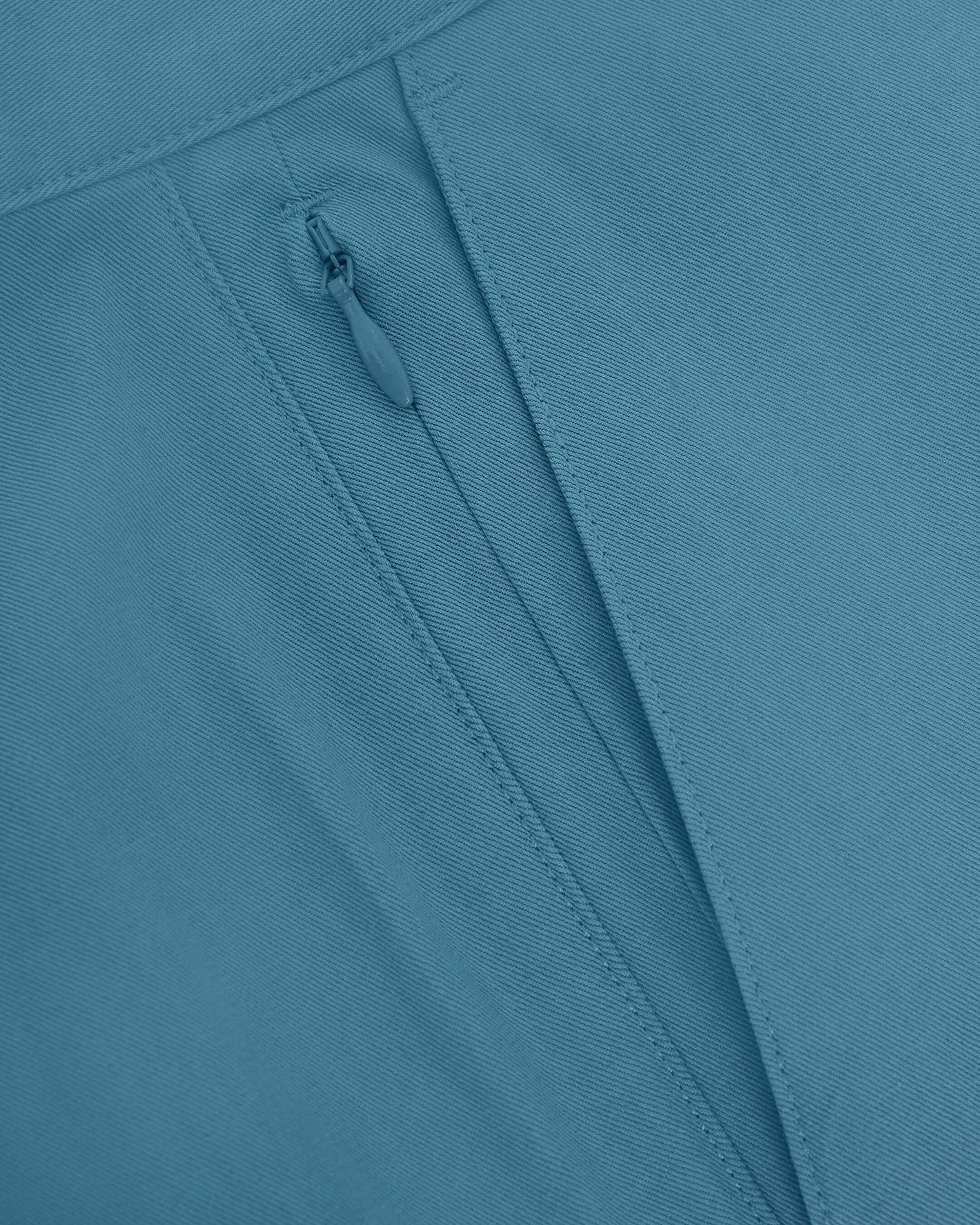 Teal fabric with invisible zipper on 7 Harbor Classic Twill Shorts.