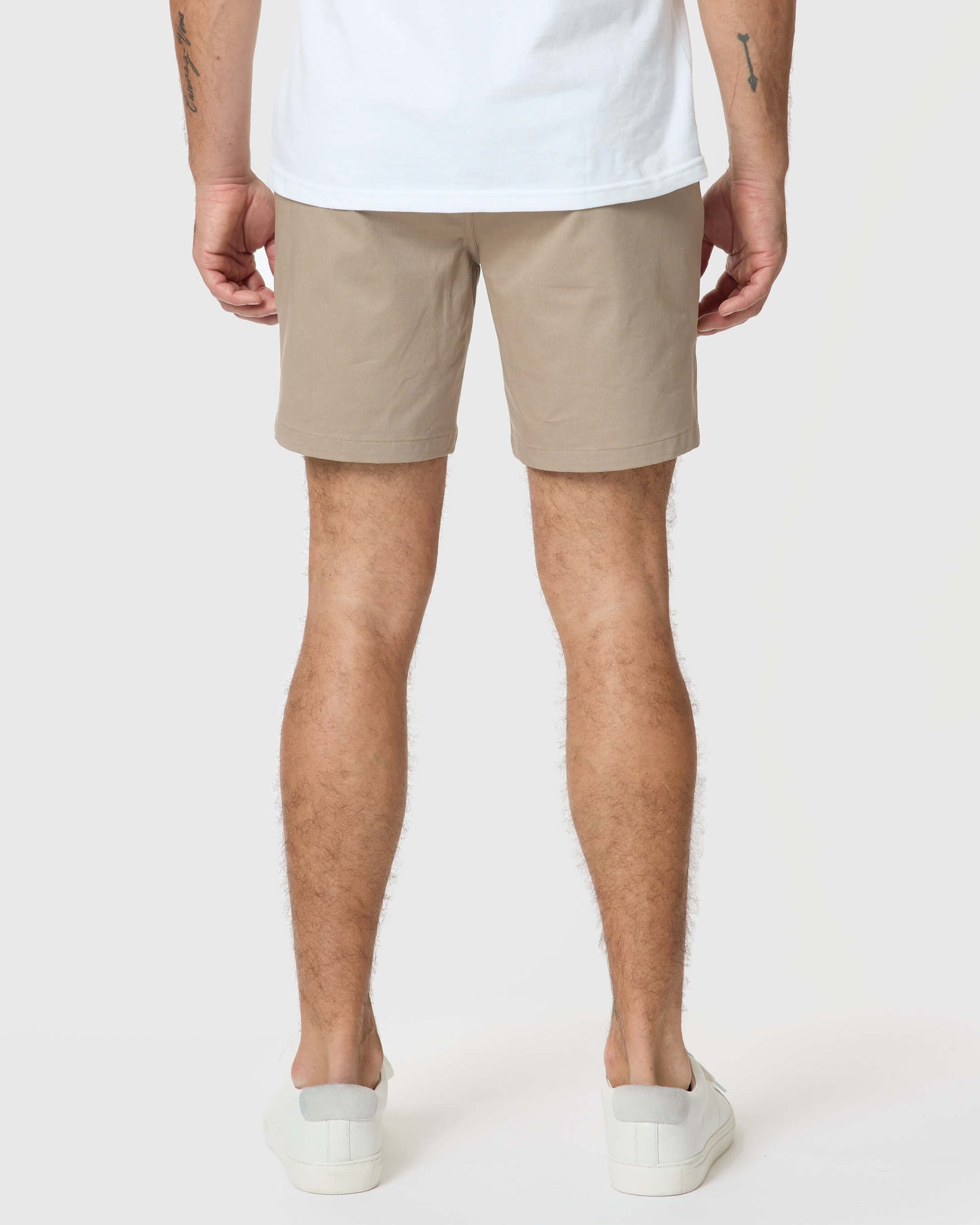 Rear view of model in 7 Khaki Classic Twill Shorts.