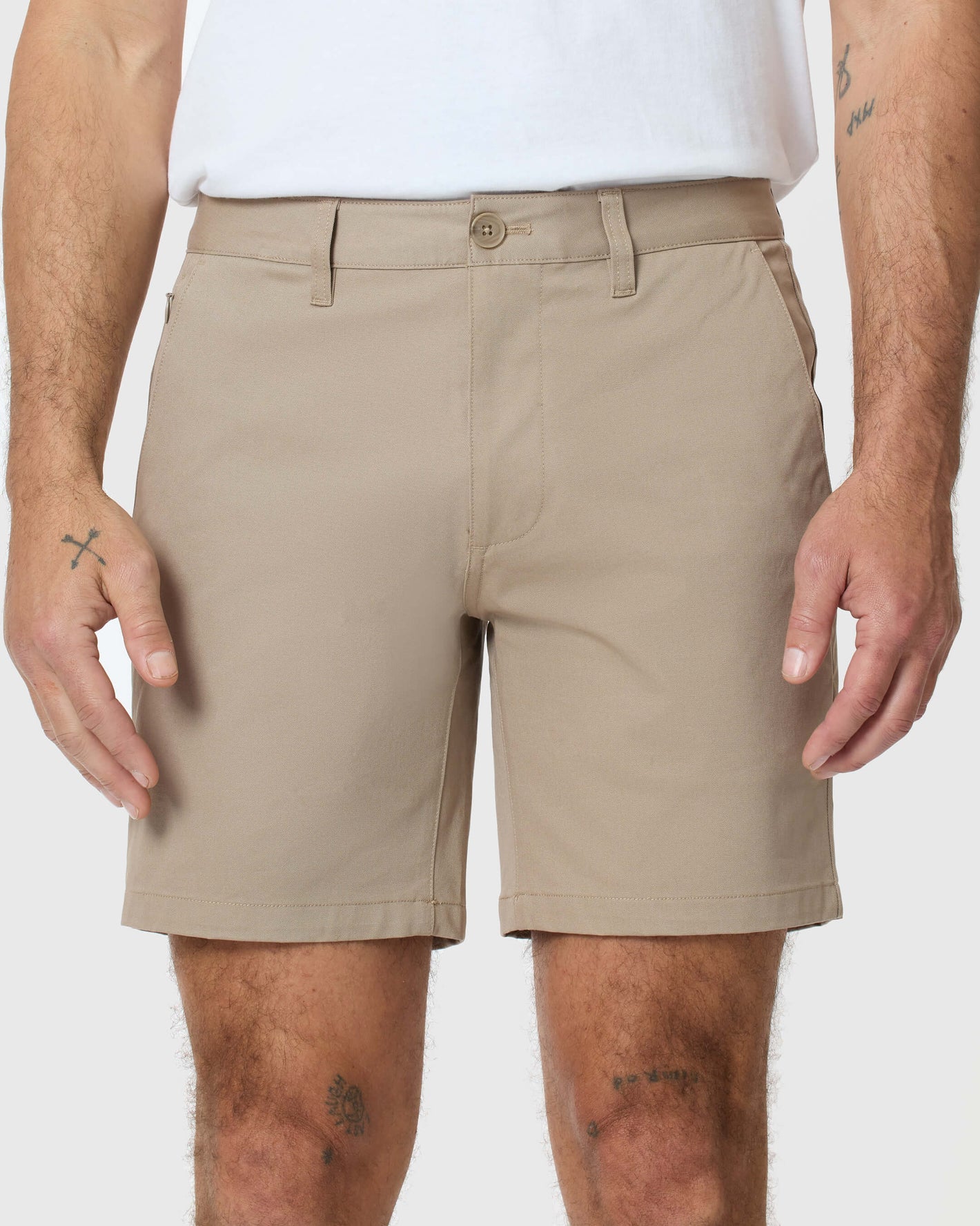 Man wearing 7 Khaki Classic Twill Shorts, highlighting comfort and durability.