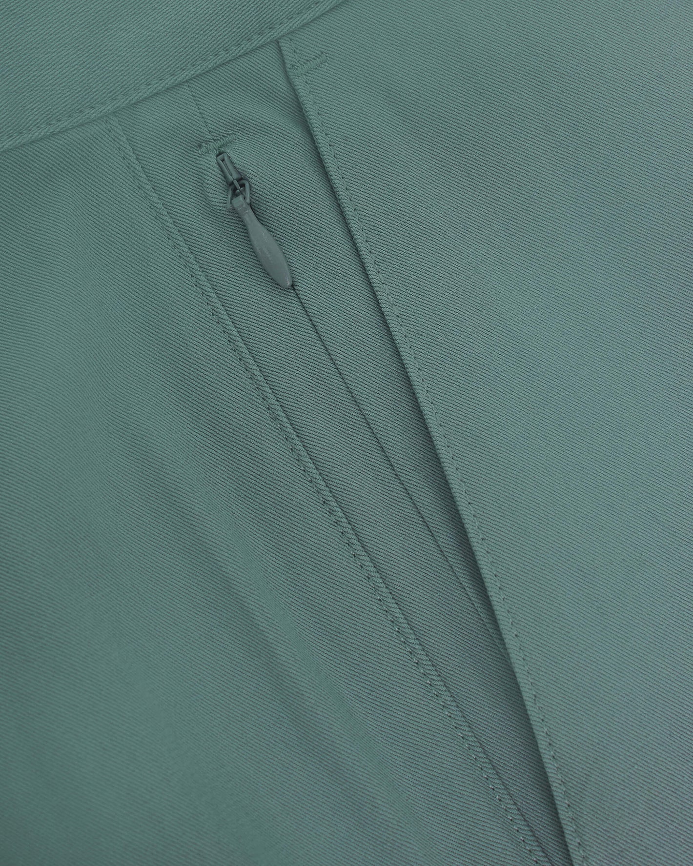7 Moss Classic Twill Shorts with concealed zipper detail.