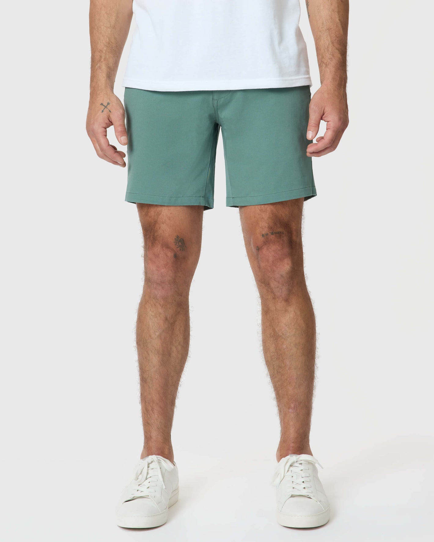 7 Moss Classic Twill Shorts worn with white sneakers.
