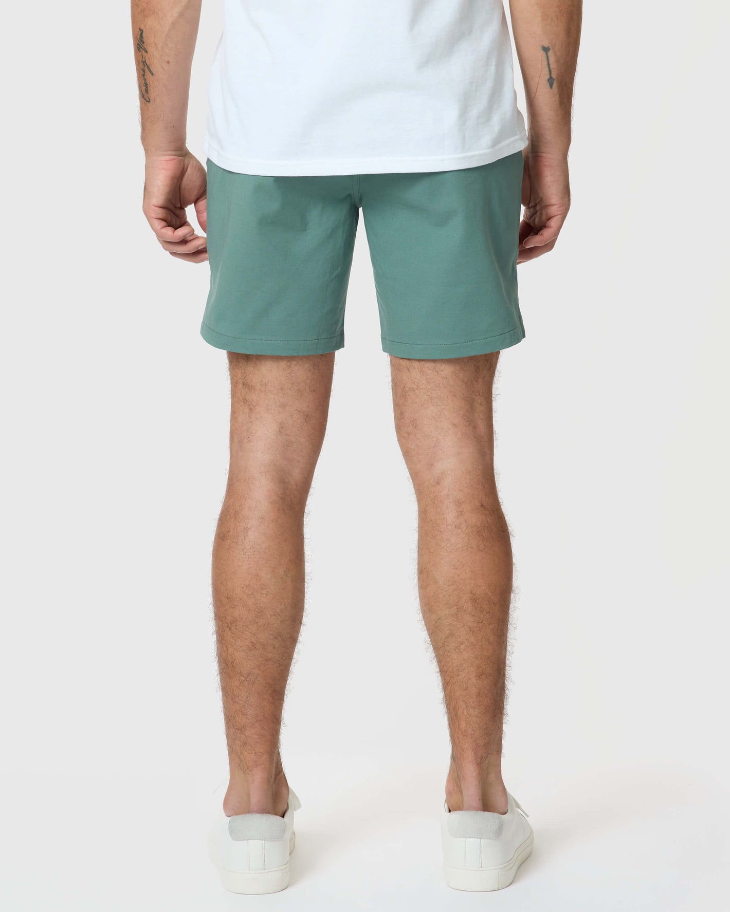 Man wearing 7 Moss Classic Twill Shorts, showcasing comfort and style.