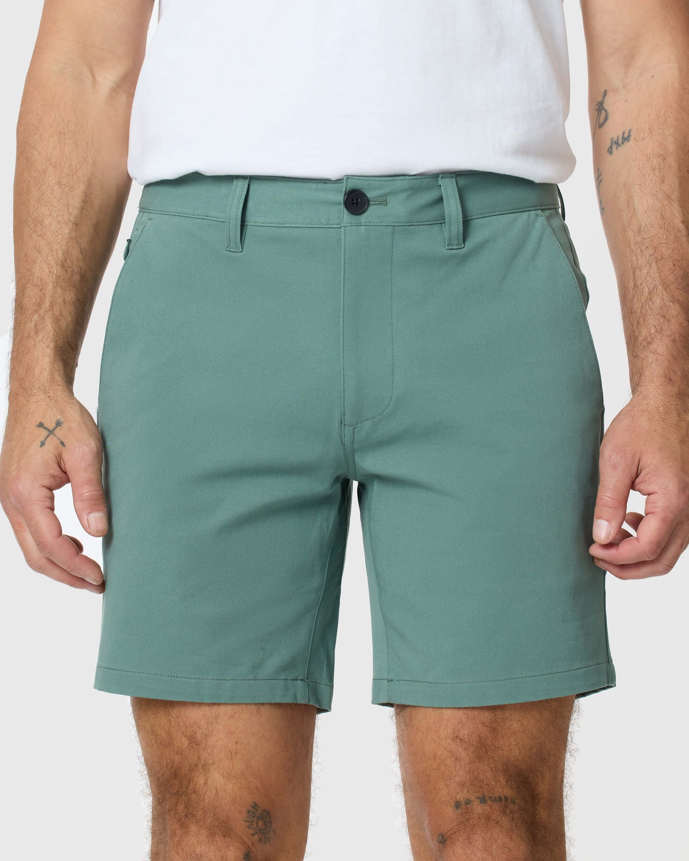 7 Moss Classic Twill Shorts on model, featuring belt loops and side pockets.