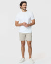 Man wearing 7 Sandstone Classic Twill Shorts, showcasing a relaxed, comfortable fit.