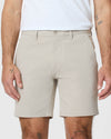7 Sandstone Classic Twill Shorts on tattooed model's legs and forearms.