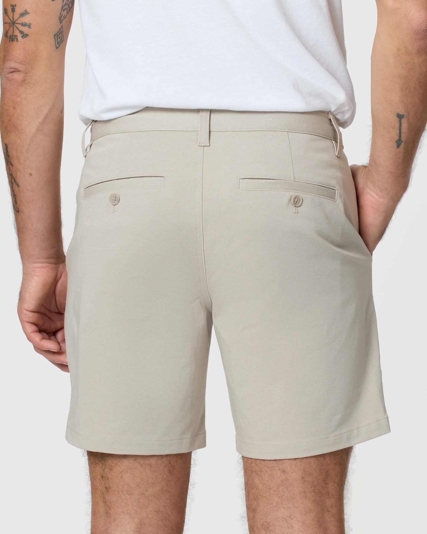 Rear view of model in 7 Sandstone Classic Twill Shorts.