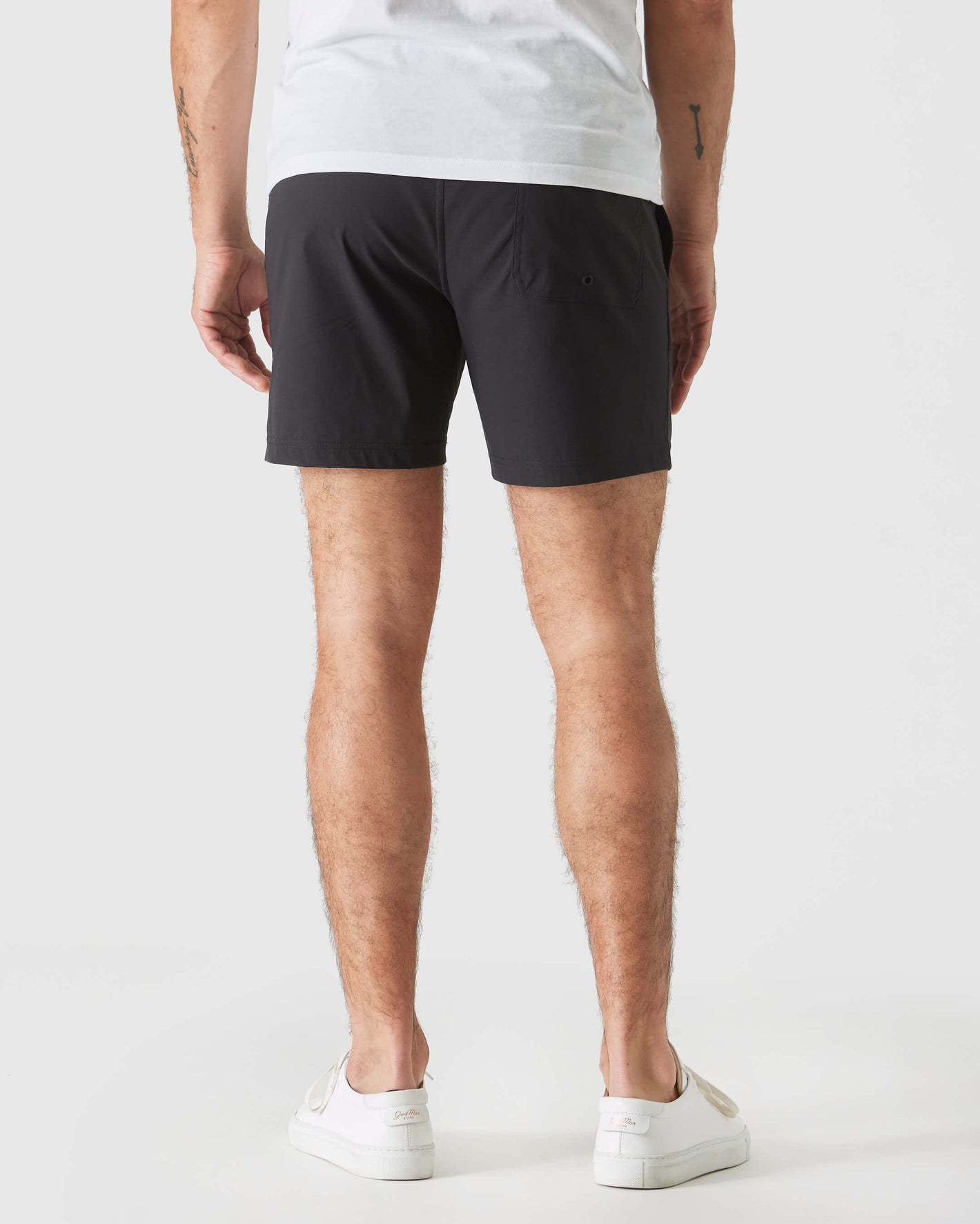 Back view of Black Swim Trunk, showcasing single back pocket.