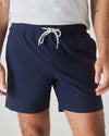Navy Swim Trunk with elastic waistband and white drawstring.