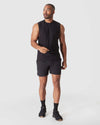 Model wearing Black 2 In 1 Training Short with athletic gear.
