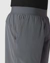 Carbon 7 2-in-1 Training Shorts with elastic waist and zippered pocket.