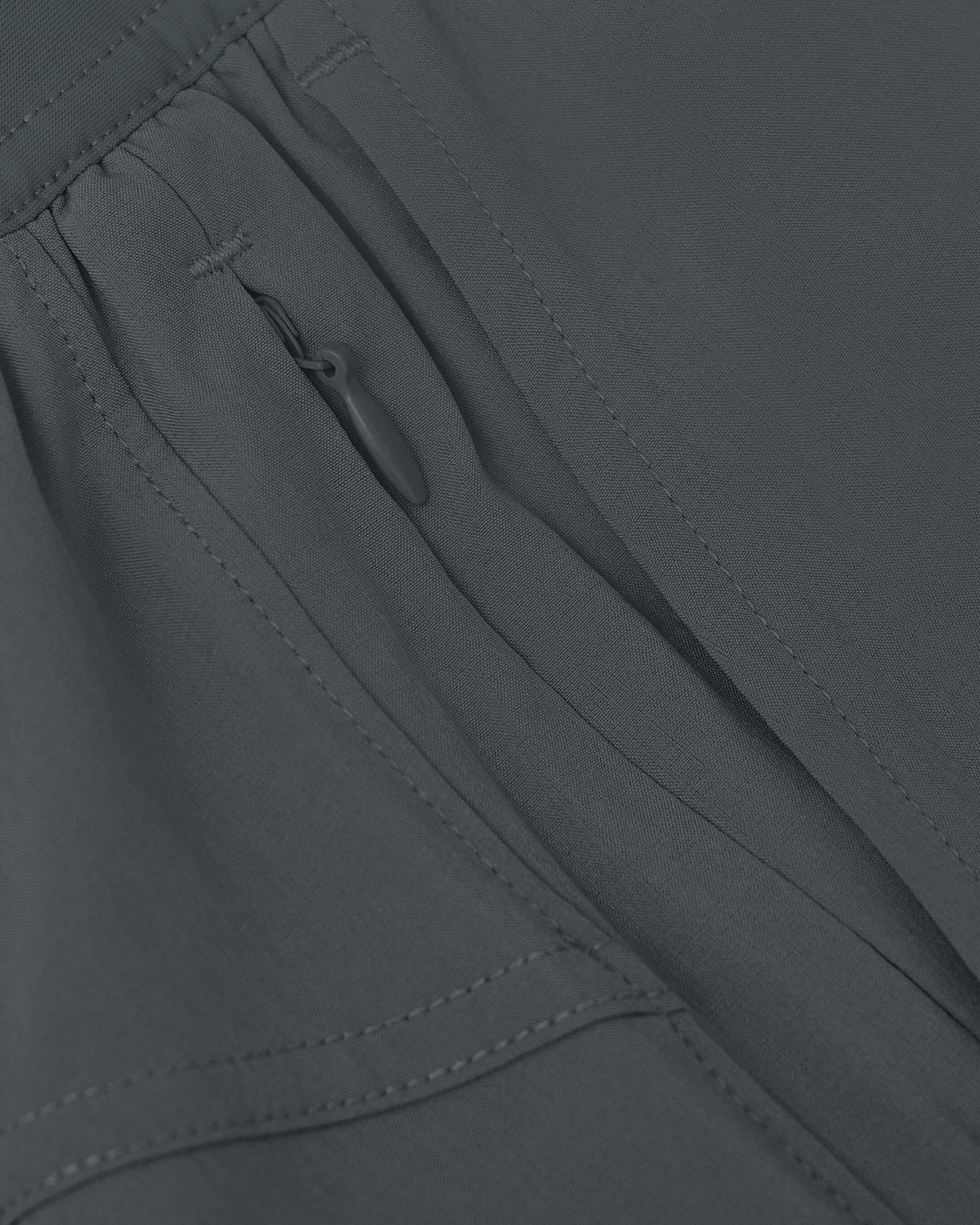 Carbon 7 2-in-1 Training Shorts showcasing zippered side pocket detail.