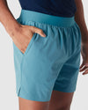 Voyager 7 2-in-1 Training Shorts with elastic waistband and pockets.