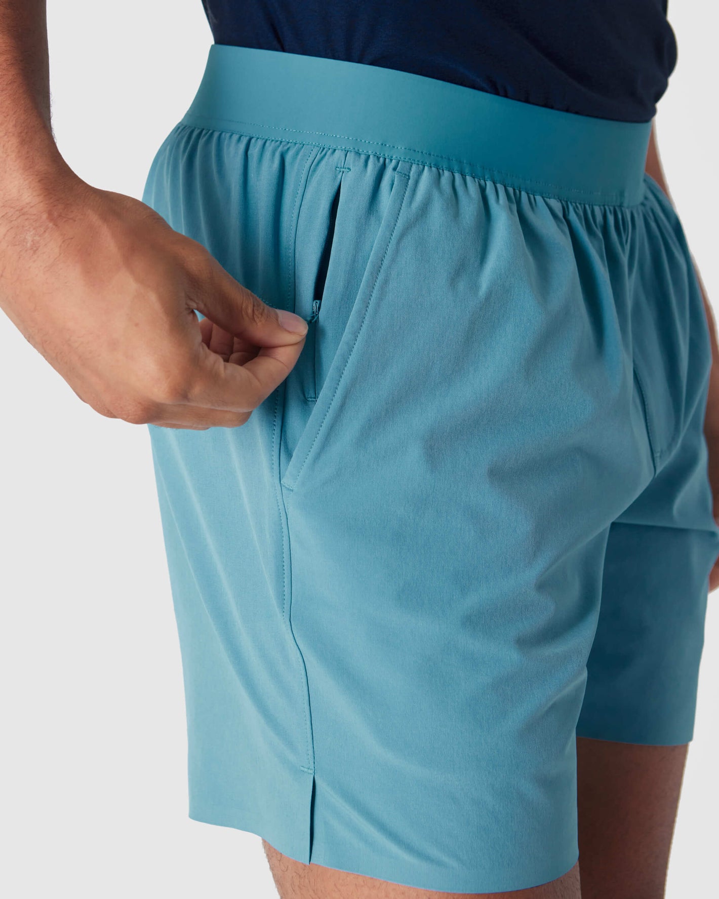 7 Carbon & Voyager 2-in-1 Training Shorts close-up, highlighting zippered pocket.